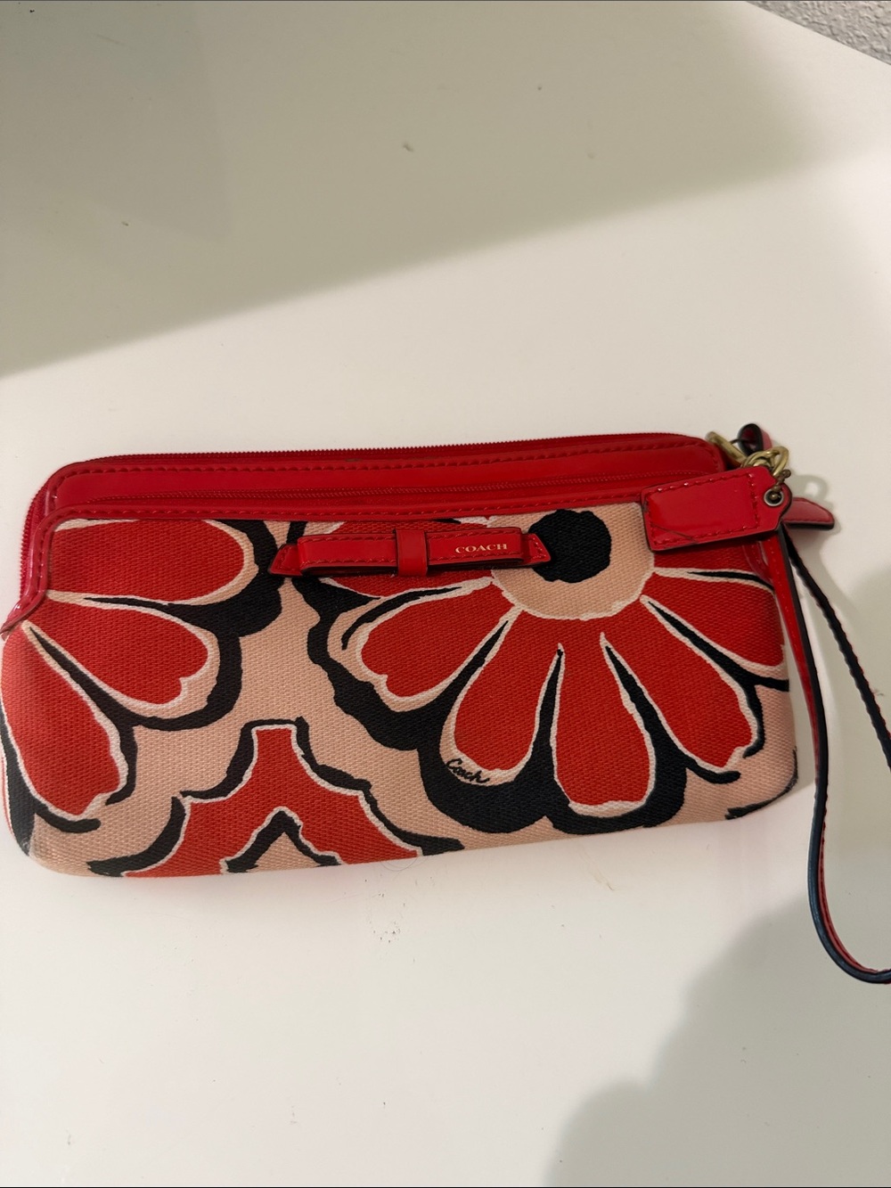 COACH Red and Pink Floral Canvas Wristlet